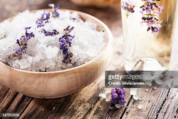 aromatherapy lavender bath salt and massage oil - bath salt stock pictures, royalty-free photos & images