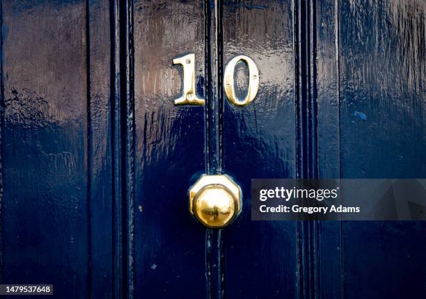 the number 10 on a door - roman numeral ten stock pictures, royalty-free photos & images