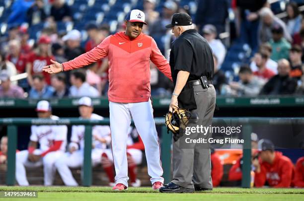 Manager Dave Martinez of the Washington Nationals argues a call with home plate umpire Larry Vanover in the second inning against the Tampa Bay Rays...