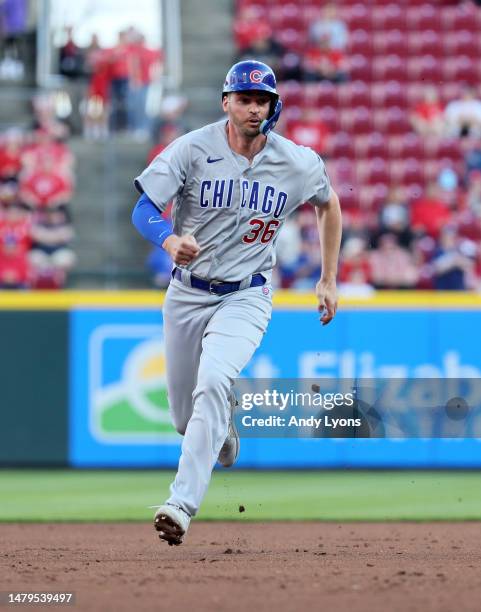 Trey Mancini of the Chicago Cubs runs to third base in the first inning against the Cincinnati Reds at Great American Ball Park on April 03, 2023 in...