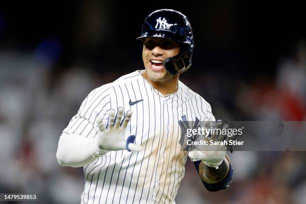 Gleyber Torres of the New York Yankees reacts after hitting a solo home run during the third inning against the Philadelphia Phillies at Yankee...