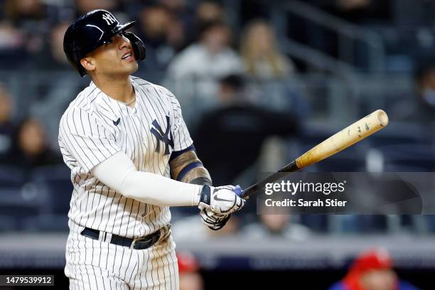 Gleyber Torres of the New York Yankees hits a solo home run during the third inning against the Philadelphia Phillies at Yankee Stadium on April 03,...