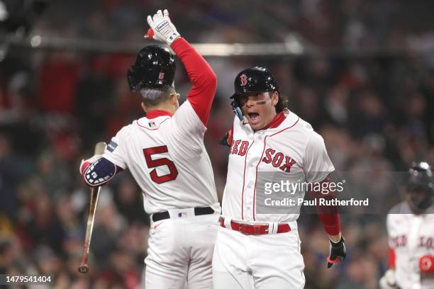 Triston Casas of the Boston Red Sox reacts after hitting a home run during the first inning against the Pittsburgh Pirates at Fenway Park on April...