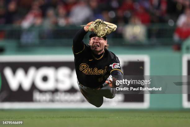 Jack Suwinski of the Pittsburgh Pirates catches a fly ball during the fourth inning against the Boston Red Sox at Fenway Park on April 03, 2023 in...