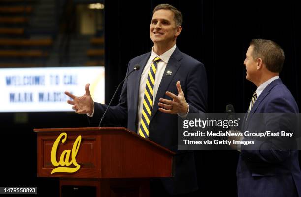New Cal mens basketball coach Mark Madsen answers questions from ESPN and Pac-12 Network broadcaster Roxy Bernstein, right, during a press conference...