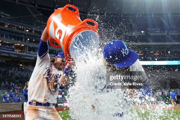 Melendez of the Kansas City Royals is splashed by Bobby Witt Jr. #7 after defeating the Toronto Blue Jays at Kauffman Stadium on April 3, 2023 in...