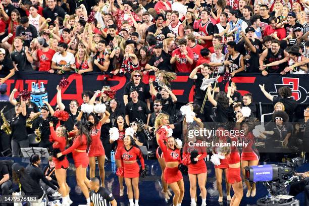 The San Diego State Aztecs cheerleaders and fans react during the second half against the Connecticut Huskies during the NCAA Men's Basketball...