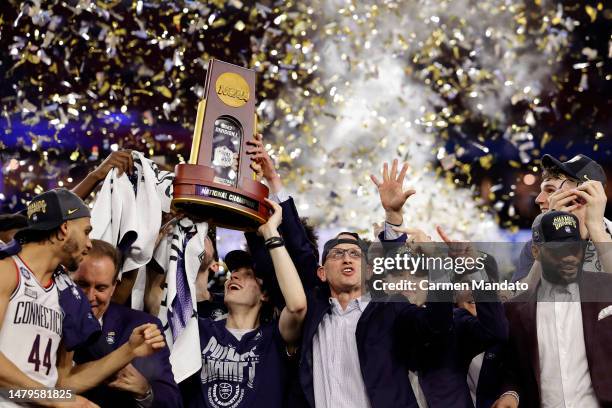 Head coach Dan Hurley of the Connecticut Huskies celebrates with his team after defeating the San Diego State Aztecs 76-59 during the NCAA Men's...