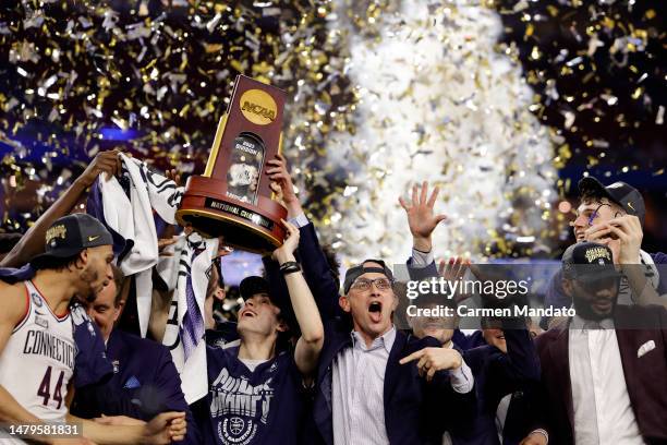 Head coach Dan Hurley of the Connecticut Huskies celebrates with his team after defeating the San Diego State Aztecs 76-59 during the NCAA Men's...