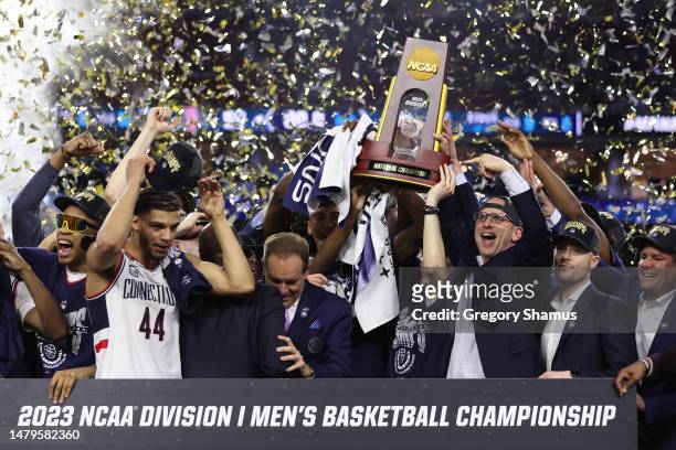 Head coach Dan Hurley of the Connecticut Huskies celebrates with his team after defeating the San Diego State Aztecs 76-59 during the NCAA Men's...
