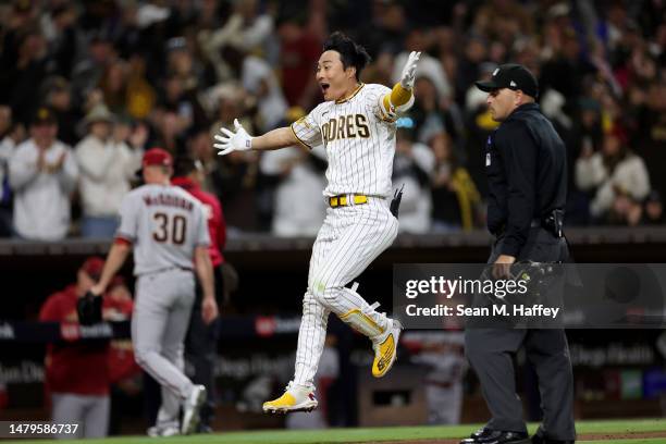Ha-Seong Kim of the San Diego Padres reacts after hitting a walk-off homerun during the ninth inning of a game against the Arizona Diamondbacks at...