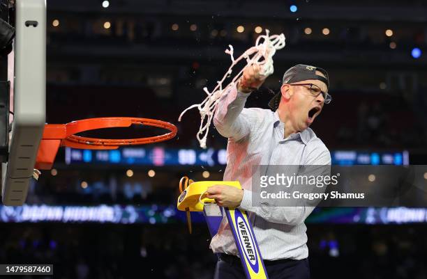 Head coach Dan Hurley of the Connecticut Huskies reacts as he cuts down the net after defeating the San Diego State Aztecs 76-59 during the NCAA...