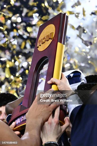 The Connecticut Huskies celebrate with the trophy after defeating the San Diego State Aztecs to win the NCAA Men's Basketball Tournament National...