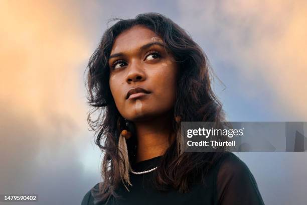 portrait of young aboriginal australian woman - aboriginal stock pictures, royalty-free photos & images