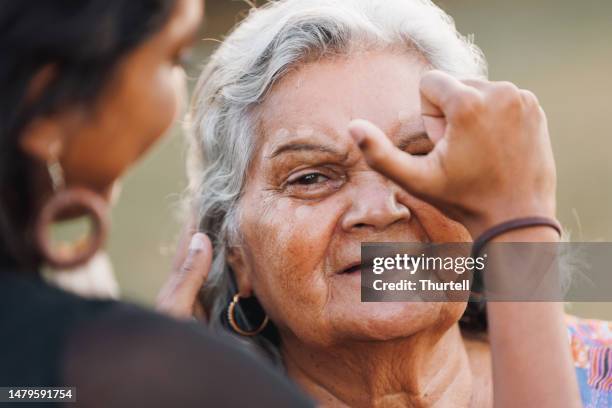 aboriginal australian grandmother - happy ethnic family stock pictures, royalty-free photos & images