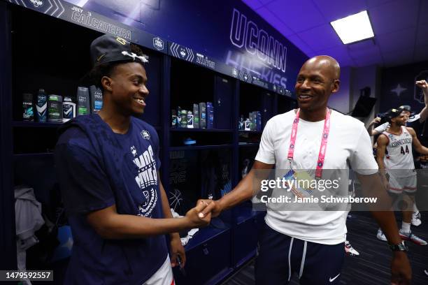 Alumni Ray Allen shakes hands with Nahiem Alleyne of the Connecticut Huskies after they defeated the San Diego State Aztecs to win the NCAA Men's...