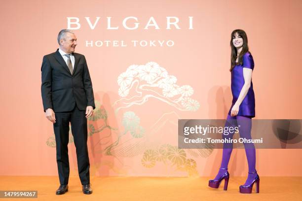 Bvlgari Group CEO Jean-Christophe Babin looks on as actress and Bvlgari global ambassador Anne Hathaway arrives for a press conference for the...