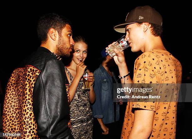 Noah Becker, Laura Zurbriggen and Jimmy Blue Ochsenknecht talk during the Michalsky Style Nite 2012 Show at the Mercedes-Benz Fashion Week...