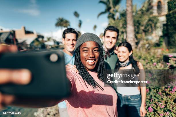 friends doing a selfie on the venice canals - la italia stock pictures, royalty-free photos & images