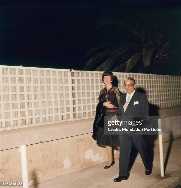 The American opera singer, of Greek origin, Maria Callas and the Greek owner Aristotle Onassis while walking. Italy, August 17th, 1960