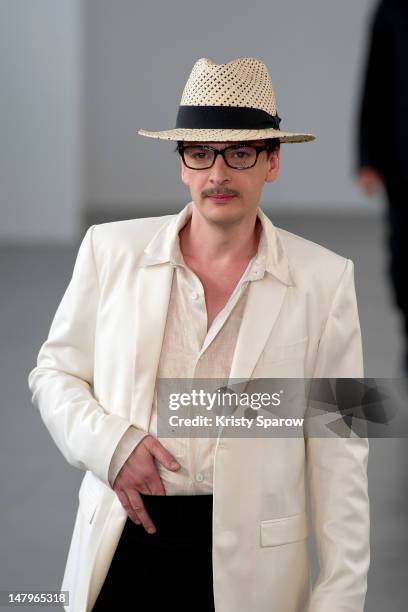 Model walks the runway during the Agnes B Menswear Spring / Summer 2013 show as part of Paris Fashion Week at Maison des Metallos on July 1, 2012 in...