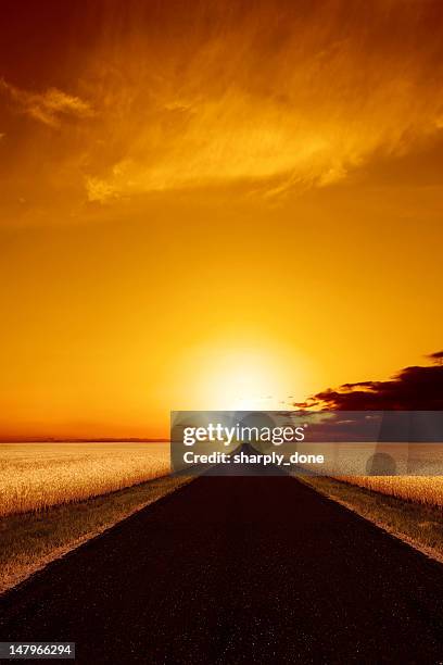 xxxl country road sunset - south dakota state v kansas stock pictures, royalty-free photos & images