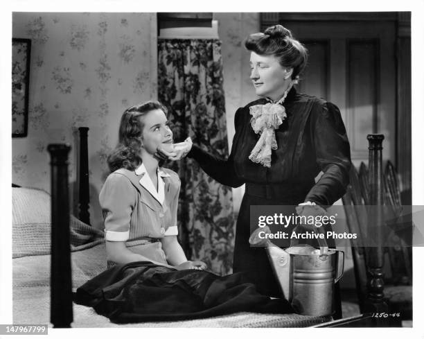 Susan Peters and Marjorie Main in touching moment together in a scene from the film 'Tish', 1942.