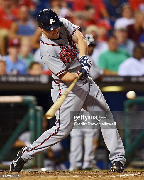 Matt Diaz of the Atlanta Braves hits a single in the eighth inning during the game against the Philadelphia Phillies at Citizens Bank Park on July 6,...