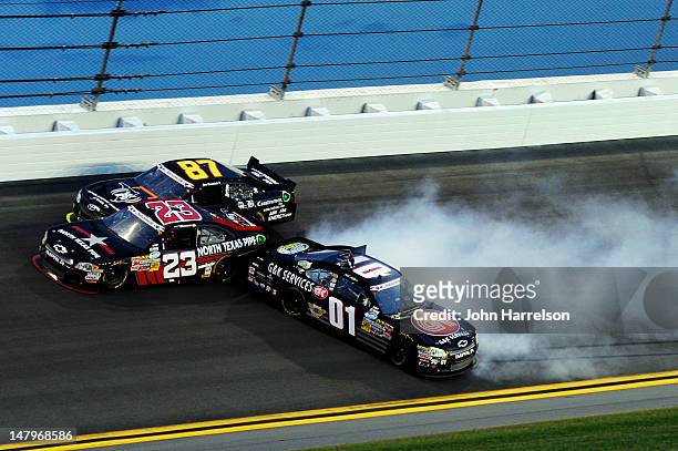Mike Wallace, driver of the G&K Services Chevrolet, wrecks during the NASCAR Nationwide Series Subway Jalapeno 250 Powered by Coca-Cola at Daytona...