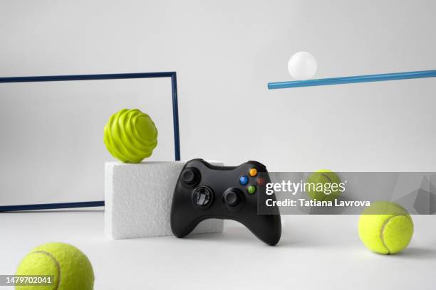 video gaming, virtual reality, technologies of the past and future, balancing between hobbies and real life concept. - brand name video game photos et images de collection