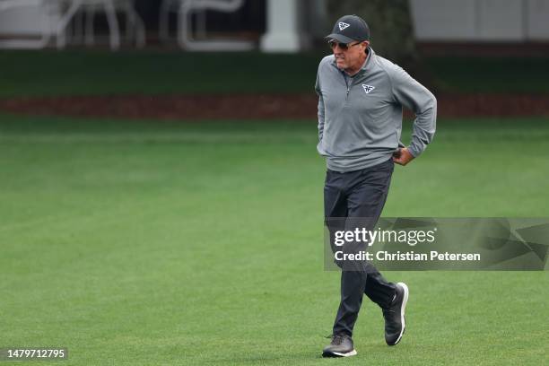 Phil Mickelson of the United States arrives to the practice area prior to the 2023 Masters Tournament at Augusta National Golf Club on April 04, 2023...