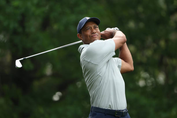 Tiger Woods of the United States plays his shot from the fourth tee during a practice round prior to the 2023 Masters Tournament at Augusta National...