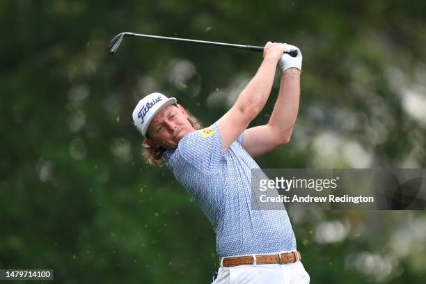 Cameron Smith of Australia plays his shot from the fourth tee during a practice round prior to the 2023 Masters Tournament at Augusta National Golf...