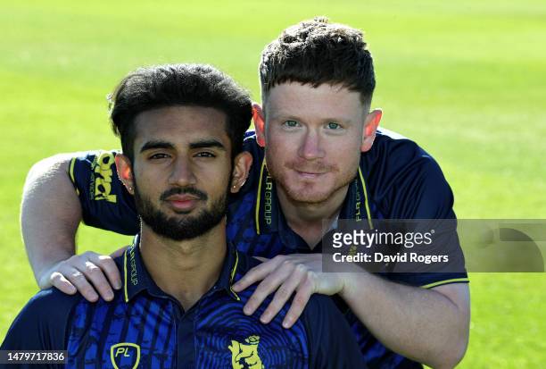 Manraj Johal and team mate Alex Davies of Warwickshire County Cricket Club pose for a portrait during the Warwickshire CCC photocall held at...