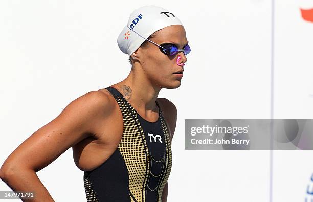 Laure Manaudou of France competes in the women's 50m backstroke of the 2012 Open EDF de Natation, an international swimming meeting held at the...