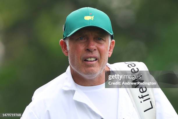 Adam Scott of Australia caddie Steve Williams looks on during a practice round prior to the 2023 Masters Tournament at Augusta National Golf Club on...