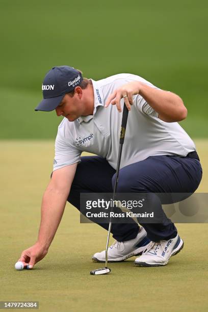 Sepp Straka of Austria lines up a putt on the third green during a practice round prior to the 2023 Masters Tournament at Augusta National Golf Club...