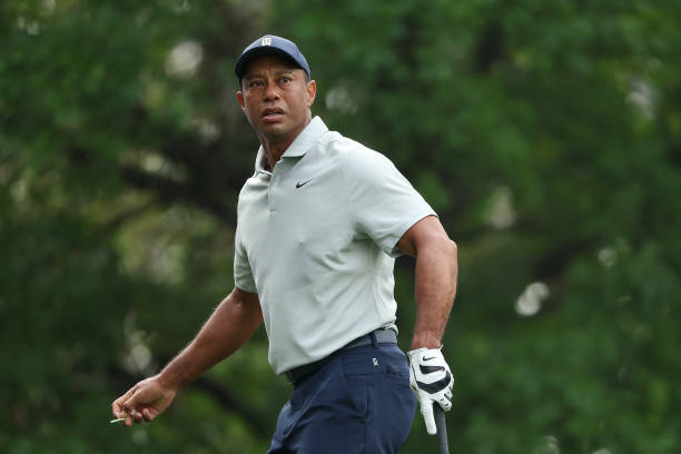 Tiger Woods of the United States looks on from the fourth tee during a practice round prior to the 2023 Masters Tournament at Augusta National Golf...