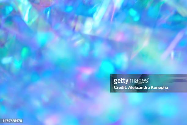 abstract ethereal blurred pastel mint, turquoise, blue, pink, purple holographic metallic foil glares  background - pastel colored stock-fotos und bilder