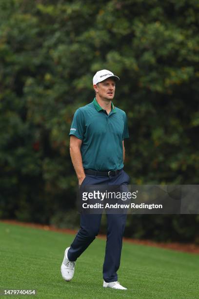 Justin Rose of England walks down the 11th fairway during a practice round prior to the 2023 Masters Tournament at Augusta National Golf Club on...