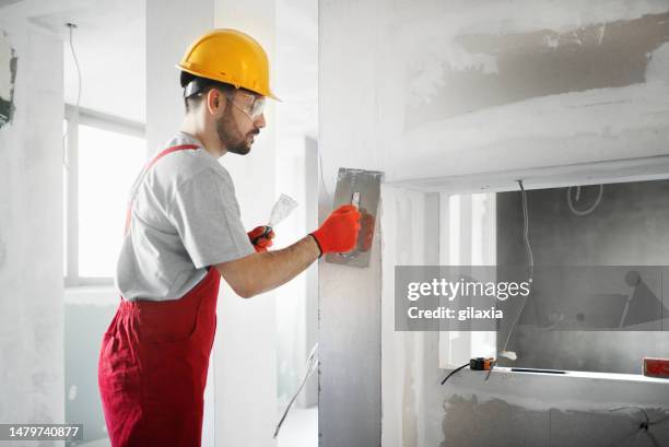 apartment ceiling renovation. - handyman stock pictures, royalty-free photos & images