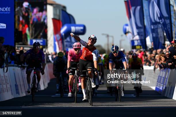 Bryan Coquard of France and Team Cofidis celebrates at finish line as stage winner ahead of Arnaud Démare of France and Team Groupama - FDJ during...