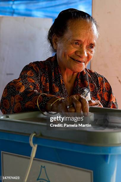 Timorese cast their vote during Parliamentary Elections on July 7, 2012 in Dili, East Timor. 21 parties are contesting in the country's first...