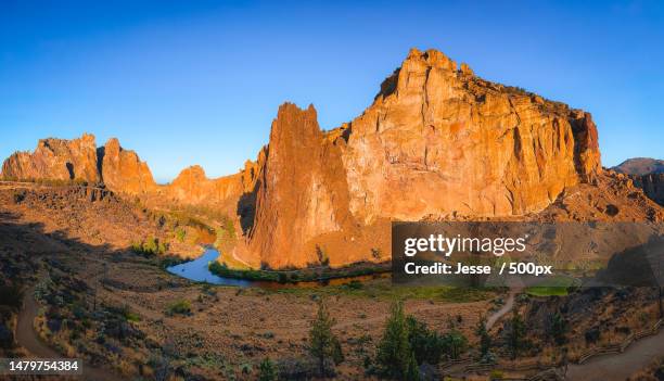 scenic view of rocky mountains against clear blue sky,smith rock state park,united states,usa - smith rock state park stock pictures, royalty-free photos & images