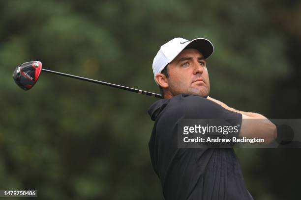 Scottie Scheffler of the United States plays his shot from the 11th tee during a practice round prior to the 2023 Masters Tournament at Augusta...