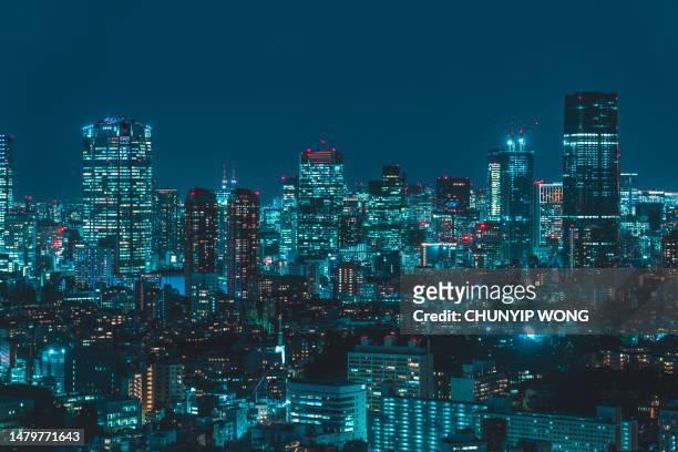 skyline of tokyo at night, japan - japan skyline stock pictures, royalty-free photos & images
