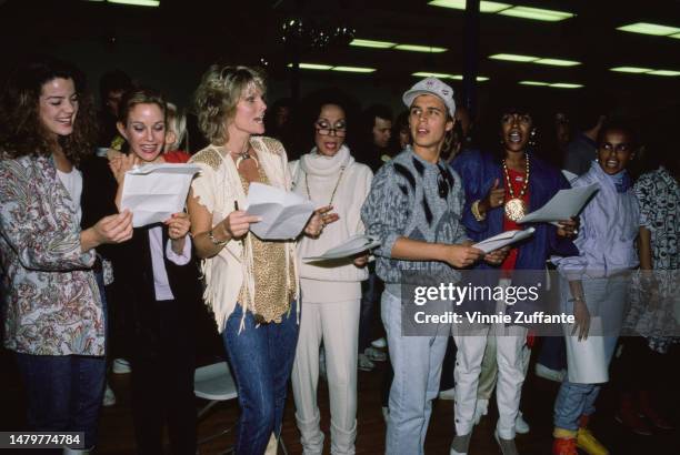 Celebrities - including Cathy Lee Crosby during the taping of "Hands Across America", United States, circa 1990.