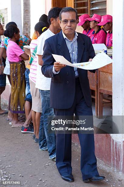 President Taur Matan Ruak receives his ballot paper during Parliamentary Elections on July 7, 2012 in Dili, East Timor. 21 parties are contesting in...