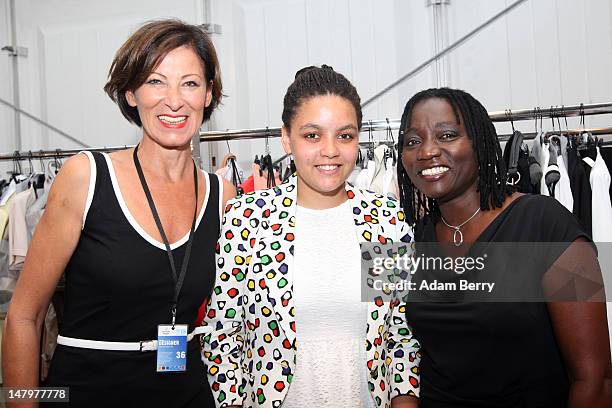 Eva Luft, Auma Obama and daughter Akini pose backstage ahead of the Minx By Eva Lux Show at Mercedes-Benz Fashion Week Spring/Summer 2013 on July 7,...
