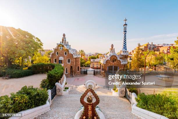 barcelona cityscape on a sunny morning seen from park guell, spain - antonio gaudi stock-fotos und bilder